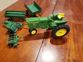 VINTAGE John Deere diecast green metal toy tractor with accessories 3