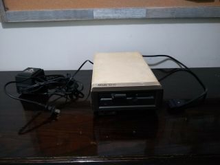 Atari 1050 Disk Drive With Power Cord And Additional Cable - Powers On