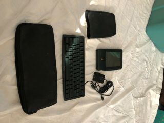 Apple Newton Messagepad H1000 (1993),  Rechargeable Battery Keyboard.  Cases