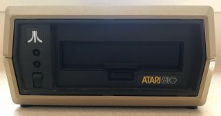 Atari 810 Floppy Disk Drive W/ Power Supply,  Serial Cables,  Dust Cover,  Joystick