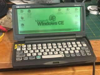 Hewlett Packard Hp 320lx Palmtop Pc Pda Windows Ce 1.  0 F1221a