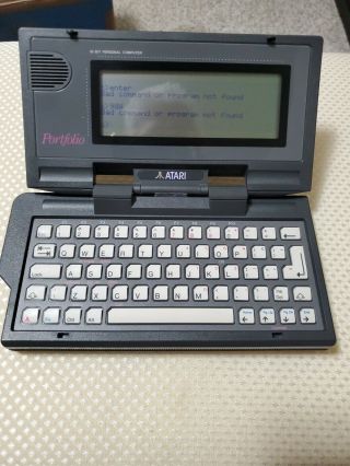 Atari Hpc - 004 Portfolio Portable Pocket Handheld Computer Turns On,  Terminator 2