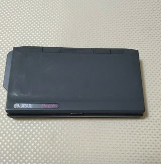 Atari HPC - 004 Portfolio Portable Pocket Handheld Computer turns on,  Terminator 2 3
