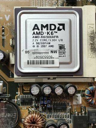 Asus SP97 - V Rev.  1.  02 Socket 7 AT motherboard w/ AMD K6 - 300 & 64MB RAM 2