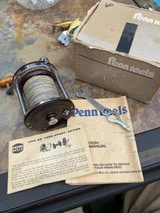Vintage Penn Fishing Reel Jigmaster 500 And Catolag