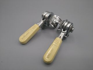 Vintage Suntour downtube shifters beige and silver 28.  6mm 3