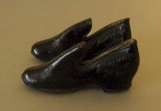 Antique Black Rubber Doll Shoes Marked American Rubber Co.