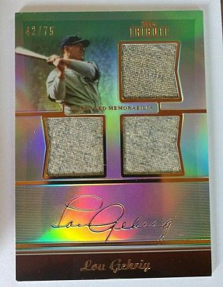 2011 Topps Tribute Lou Gehrig Baseball Card,  Game Relic 42/75,  Three Jersey