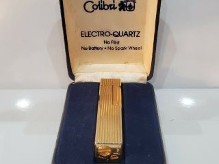 VINTAGE COLIBRI JAPAN GOLD TONE LIGHTER,  FLINT & SOFT FLAME COLIBRI BOX 2
