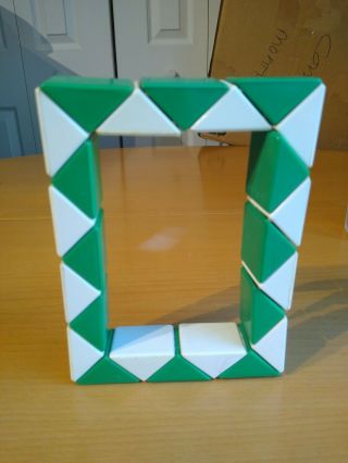 Vtg 1980s Magic Snake Puzzle Cube Green & White Plastic Twist Toy Game