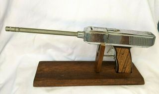 Vintage Chrome Gun Pistol Lighter Wood Stand.  Unique