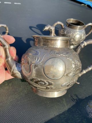 A large set 19th century Chinese carved silver dragon tea set 3