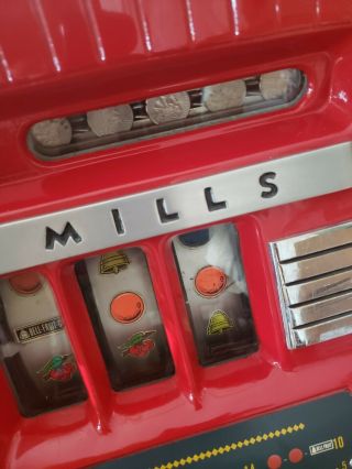 Mills slot machine.  World War time 1940 ' s vintage / Antique Casino coin op slot. 2