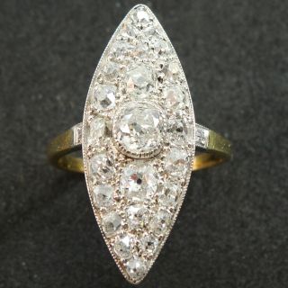 1.  60 Carat Antique 1910 - 1920s Old Mine Cut Diamond Marquise Navette Ring