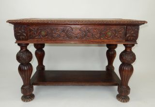 Antique Intricately carved Oak Library Table 50.  25 