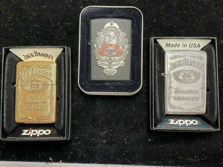 3 Zippo Lighters.  " Jack Daniels " - " 1850 - 2000 " & Traditional Logos.  In Boxes E17