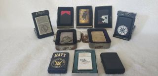 Collectible Zippo Lighters As Group Of 10 - Us Navy,  Marlboro,  Jack Daniels