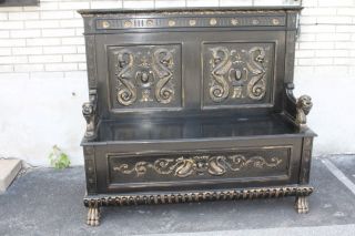 Great English Victorian Ebonized Heavily Carved Hall Bench,  19th Century