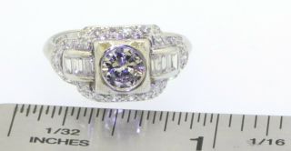 Antique Platinum 1.  24CTW VS diamond wedding/engagement ring w/.  70CT ctr.  size 6 3