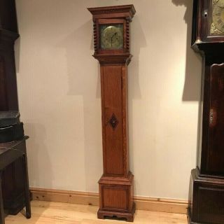 Grandmother Clock Oak Cased Westminster Chimes 8 Day Mechanical Movement.