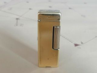 Vintage (pat: 1938) Dunhill Rollalite Petrol Lighter Swiss Made