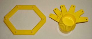 6 Vintage Tupperware Yellow Measuring Cups And Hanging Rack