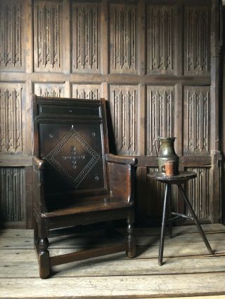 A Rare 17th Century Welsh Oak Enclosed Armchair Carved With Bullseyes