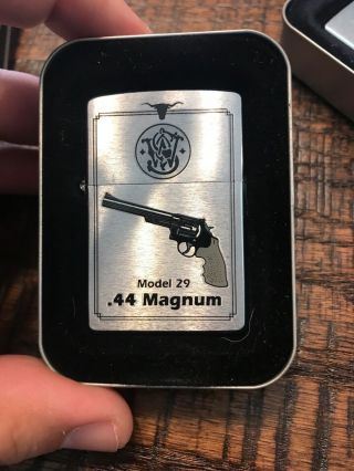 Authentic Smith & Wesson Model 29.  44 Magnum Brushed Chrome Zippo Lighter & Tin
