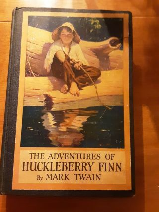 Vintage Book Titled The Adventures Of Huckleberry Finn By Mark Twain