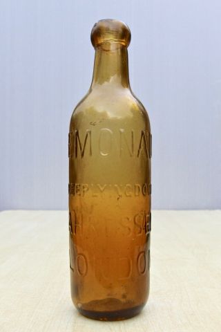 Vintage C1900s Josiah Russell & Co London Keep Lying Down Amber Lemonade Bottle