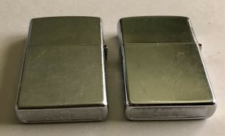 2 VINTAGE ZIPPOS.  LIGHTERS STATUE OF LIBERTY & ANNIVERSARY ONE NOT FIRED 2