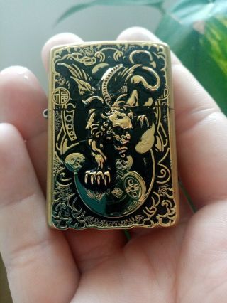 Golden devil Dragon Zippo solid brass dated XVI insert dated XV no box 2