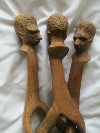 VINTAGE CARVED WOODEN TRIPOD STAND WITH CARVED HEADS & FEET ONE PIECE WOOD 3