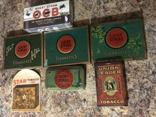 4 Lucky Strike Tins,  Union Leader Pocket Tin,  O C B Cigarette Papers,  & 5 Star