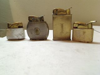 Vintage Lighters Evans Of 4