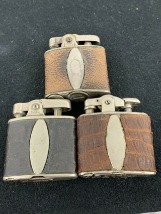 3 Vintage Ronson Standard Pocket Lighters - Art Metal With Leather Wraps