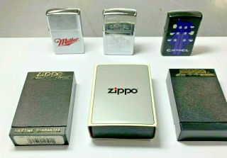 3 Vintage Zippo Lighters 2 Camel Lighters 1 Miller Zippo
