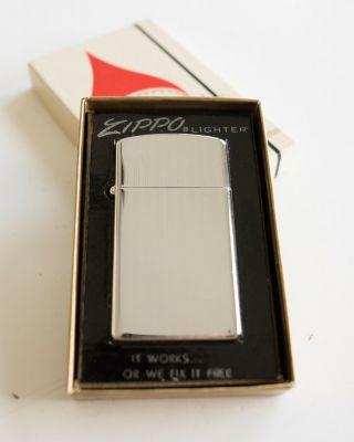 Vintage Zippo Slim Lighter,  Chrome,  Flat Bottom,  Never Fired