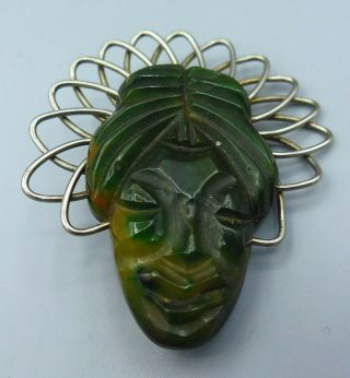 Vintage Dark Green And Yellow Swirled Carved Bakelite Figural Pin Or Brooch