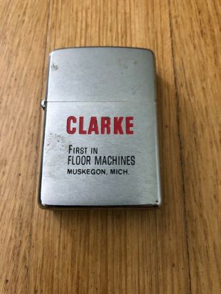 Vintage Zippo Lighter.  Clarke Floor Machines.  Muskegon,  Mich.