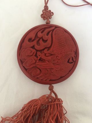 Vintage Chinese Carved Dragon Red Cinnabar Pendant With Tassel 2” Diameter