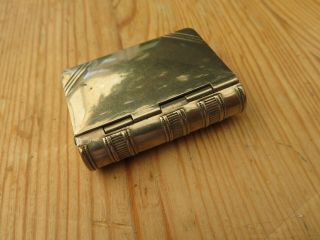 A Fine Old Metal Novelty Book Vesta And Stamp Case Striker To The Base