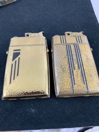 2 Vintage Evans Cigarette Case Lighters - Gold Tone With Black Enamel