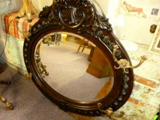 Antique Oak Mirror Frame Ornate carvings Beveled mirror Lion head hoods 1900 ' s 2