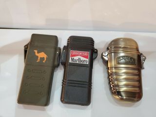 Set Of 3 Vintage 1992 Marlboro Adventure Team Lighter Black & 2 Camel Lighters
