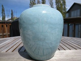 A Chinese Export Celadon Caved Porcelain Jar,  Yongzheng Mark And The Period