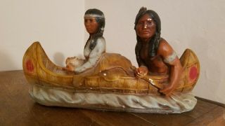 Vintage Chalkware Native American Indian Man And Woman In Canoe On Water