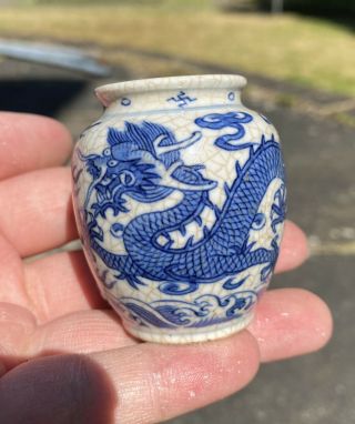 A Rare Early 19century Chinese Crackle Glazed Blue And White Dragon Snuff Bottle