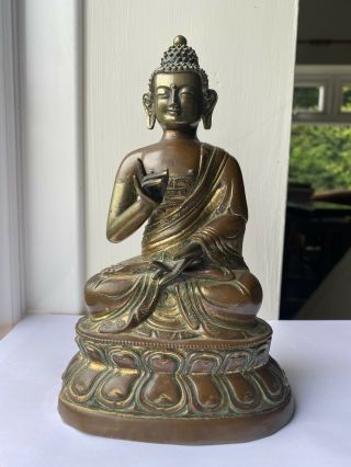 Chinese Tibetan Gilt Bronze And Copper Repousse Buddha Seated On Lotus Base 18th