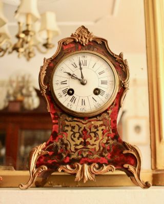 A C19th French Boulle Mantel Clock With Bell Strike And Ormolu Mounts